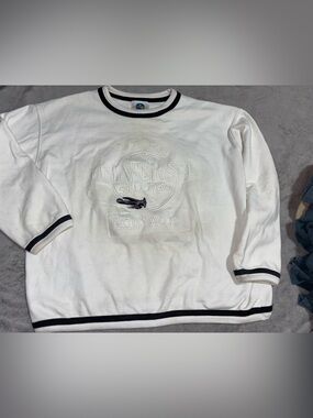 Universal White Crewneck Sweater with Black Trim